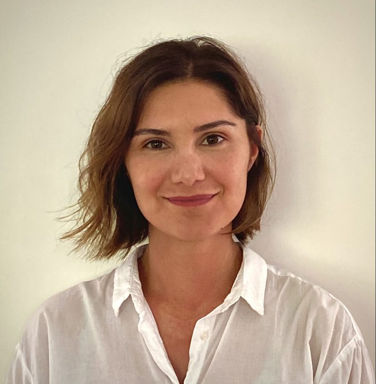 Smiling woman with short brown hair