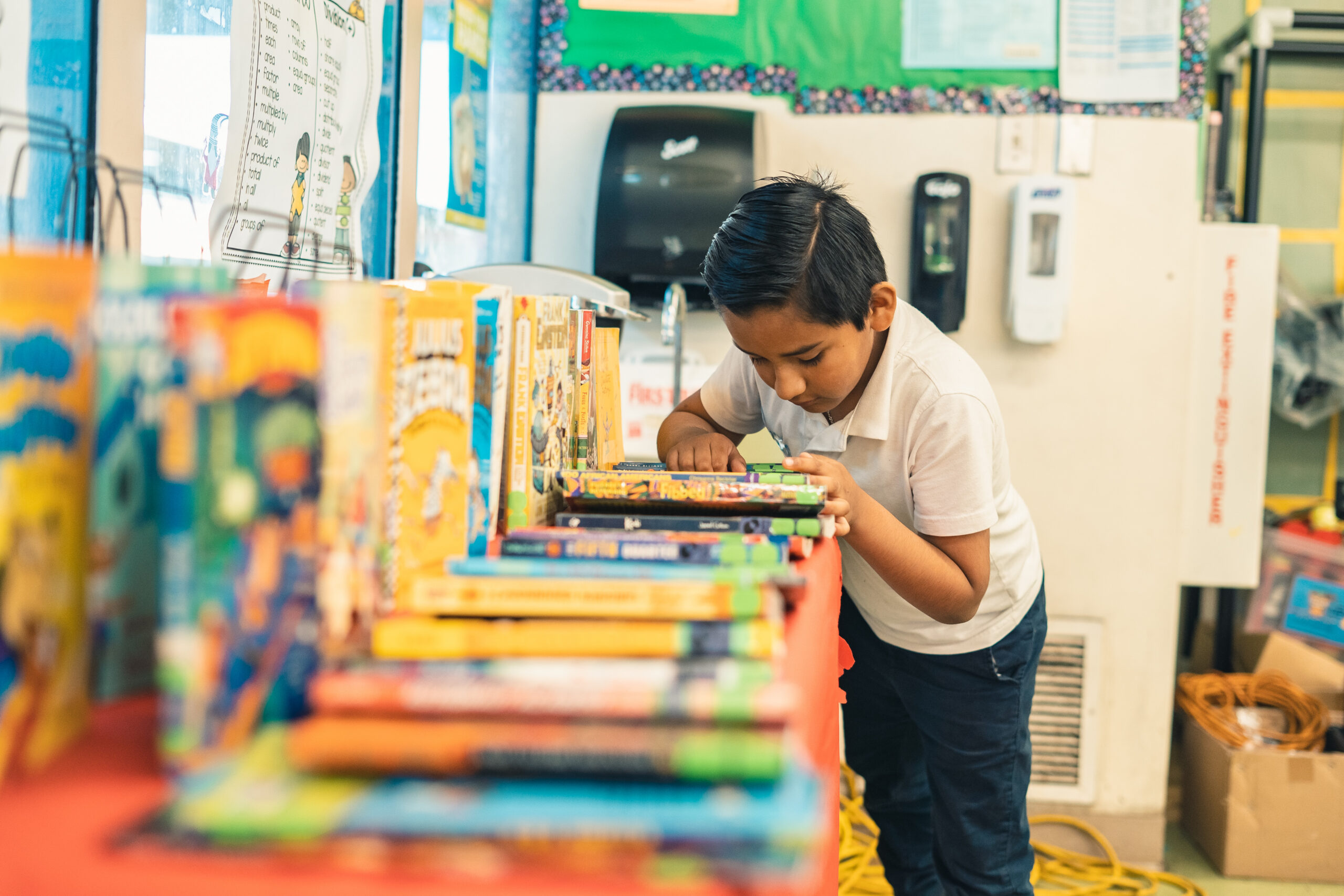 J3 student reading books